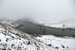 A view of a snow-covered lake in East Azarbaijan in mid-autumn