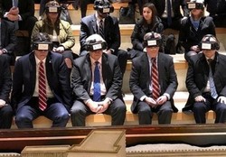 Bolton (1st row-2nd R) and others are seen wearing virtual reality goggles during a visit to the Western Wall in East Jerusalem al-Quds' Old City, January 6, 2019.