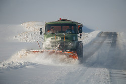 Snowplow crews clear snow from Golestan province's roads