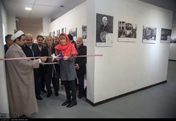 Maria Dotsenko (2nd R), director of the United Nations Information Centre (UNIC) in Tehran, cuts the ribbon to launch an exhibition of photos and documents on Iran-UN relations at the Shahid Avini Com