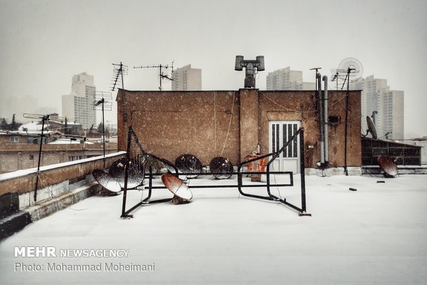 Heavy hail, snow hit Tehran