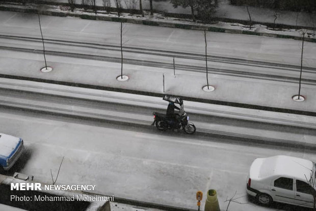 Heavy hail, snow hit Tehran