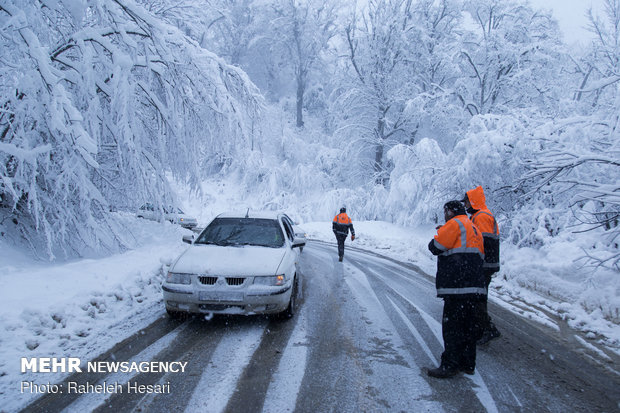 Snowplow crews clear snow rom Golestan province's roads