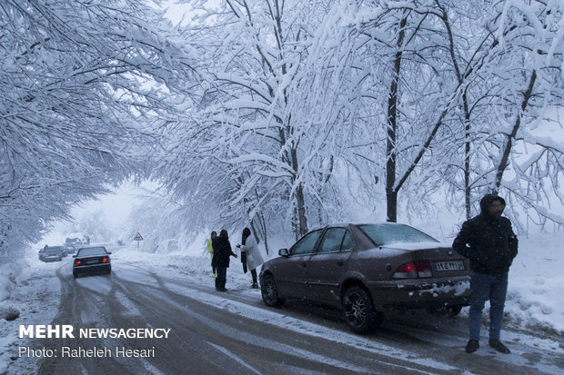 Snowplow crews clear snow rom Golestan province's roads