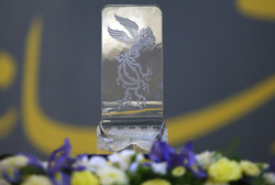 A Crystal Simorgh trophy.