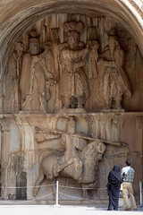 A couple visit Sassanid-era bas-relief carvings at Taq-e Bostan, Kermanshah province.