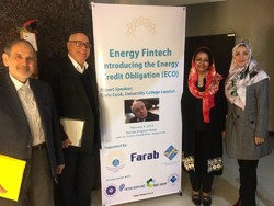 Chris Cook (2nd L), a senior research fellow at the Institute for Strategy, Resilience and Security Studies at University College London, and Mahmood Khaghani (1st L), an Iranian energy expert, posing for a photo during a specialized panel meeting in Tehran on Tuesday