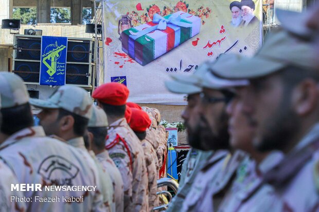 Two anonymous martyrs laid to rest in Payame Noor Uni.