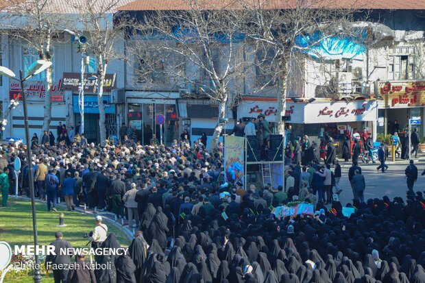 Two anonymous martyrs laid to rest in Payame Noor Uni.