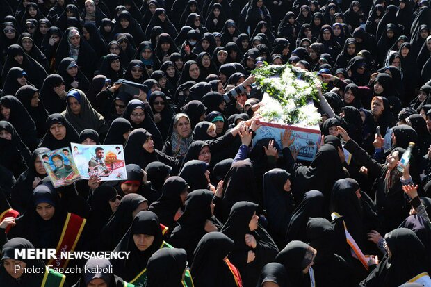 Two anonymous martyrs laid to rest in Payame Noor Uni.