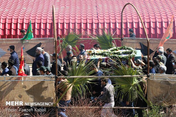 Two anonymous martyrs laid to rest in Payame Noor Uni.