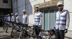Police on bikes in central Tehran to promote bike-riding