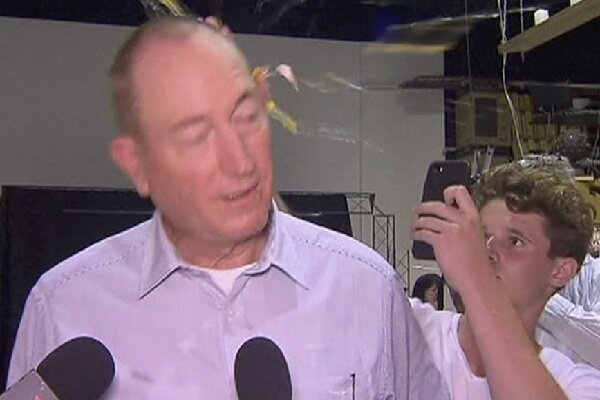 VIDEO: Teenager cracks egg on Australian senator’s head