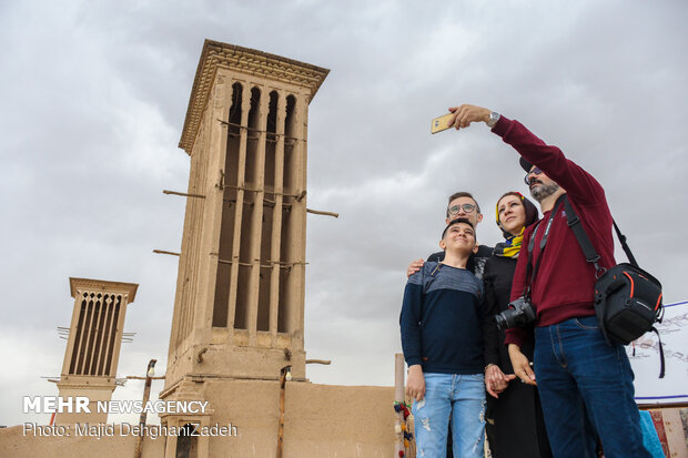 Travelers visit historical monuments in Nowruz