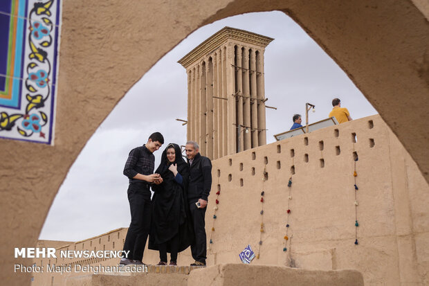 Travelers visit historical monuments in Nowruz