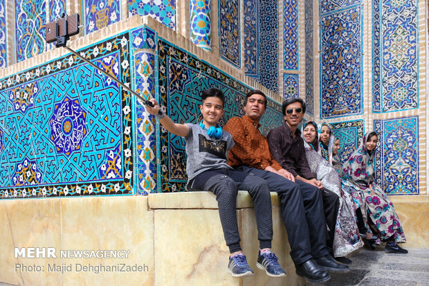 Travelers visit historical monuments in Nowruz