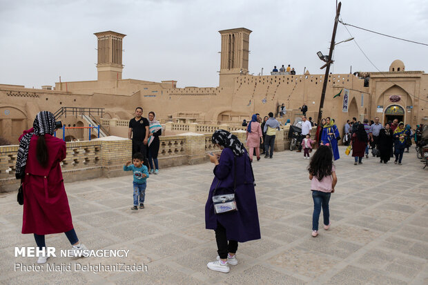 Travelers visit historical monuments in Nowruz