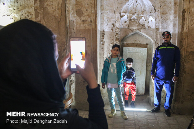 Travelers visit historical monuments in Nowruz