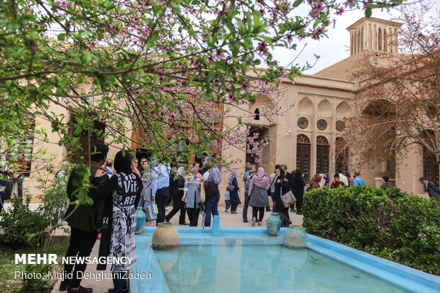 Travelers visit historical monuments in Nowruz