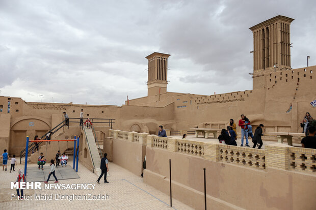 Travelers visit historical monuments in Nowruz