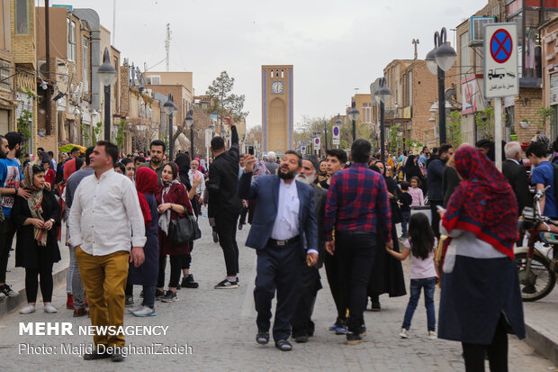 Travelers visit historical monuments in Nowruz