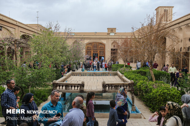 Travelers visit historical monuments in Nowruz