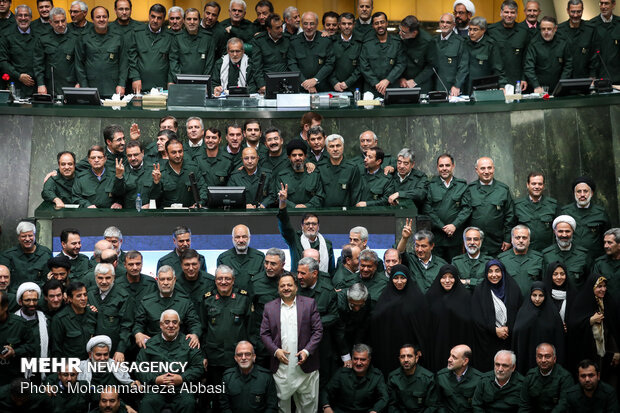 MPs dressed in IRGC uniform in open session