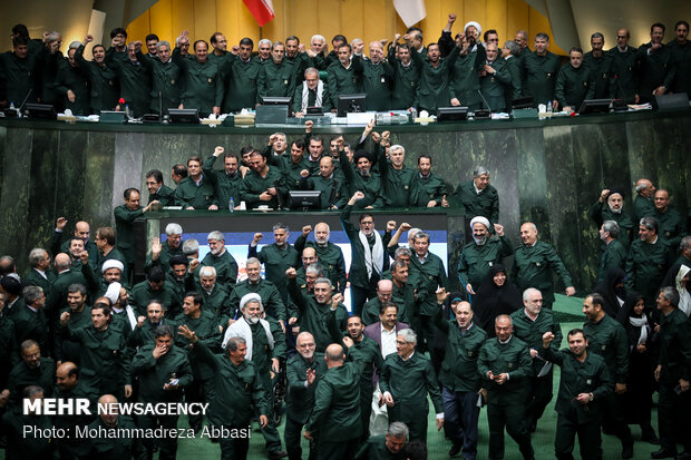 MPs dressed in IRGC uniform in open session