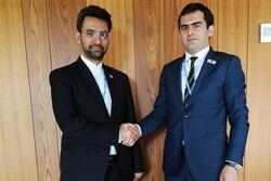 Iran’s ICT Minister Mohammad Javad Azari Jahromi (l) shakes hand with his Armenian counterpart Hakob Arshakyan