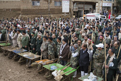 Rescue and relief teams in flood-hit Pol Dokhtar hold rally in support of IRGC