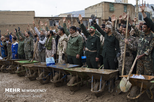 Rescue and relief teams in flood-hit Pol Dokhtar hold rally in support of IRGC