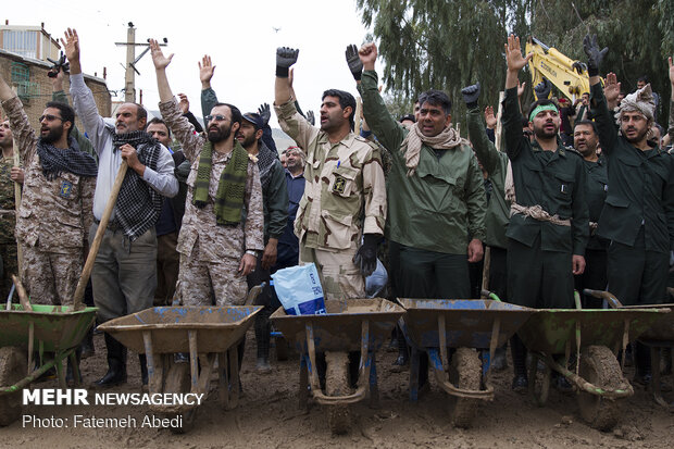 Rescue and relief teams in flood-hit Pol Dokhtar hold rally in support of IRGC