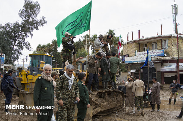 Rescue and relief teams in flood-hit Pol Dokhtar hold rally in support of IRGC