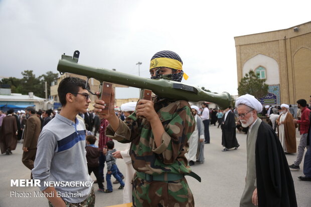 People in Qom march to protest at US' IRGC blacklisting