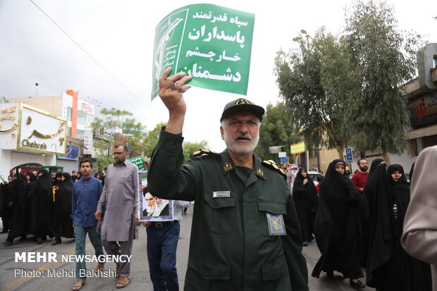 People in Qom march to protest at US' IRGC blacklisting