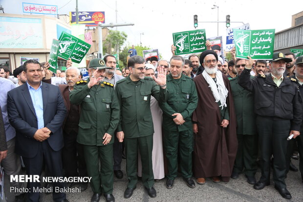 People in Qom march to protest at US' IRGC blacklisting