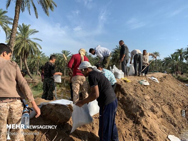 Bahraini residents in Iran helping flood-stricken people in Khuzestan prov.