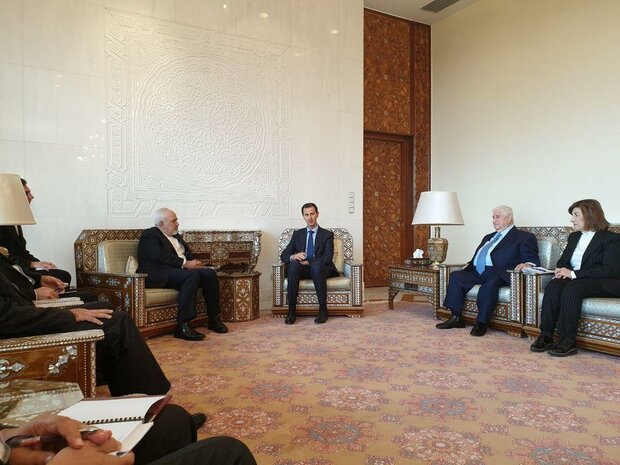 Iran’s Zarif meets with Assad in Damascus