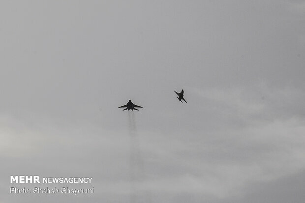 Home-grown fighter jets fly during Army day parades