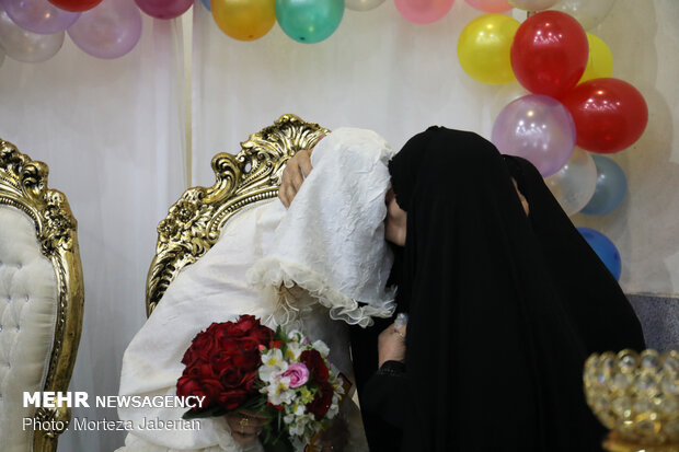 Marriage ceremony of flood-stricken couple in Khuzestan prov.