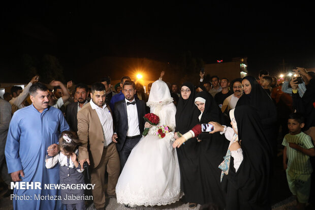 Marriage ceremony of flood-stricken couple in Khuzestan prov.