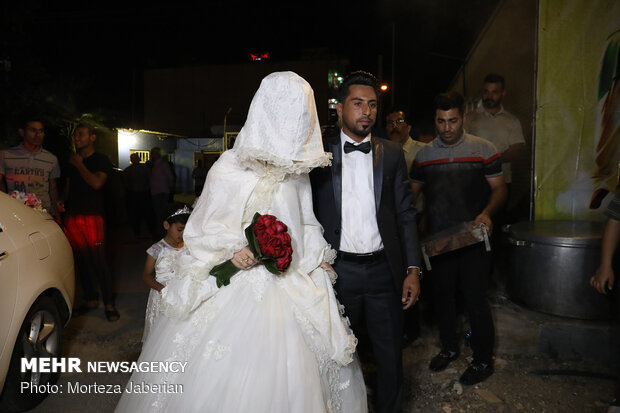 Marriage ceremony of flood-stricken couple in Khuzestan prov.