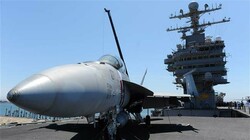 A Boeing FA18 Superhornet on the flight deck of the USS Abraham Lincoln in July 2011. (Photo by AP)