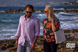 Bahram Radan (L) and Andrea Machallekidou act in a scene from director Azita Mugui’s “Main Idea”.