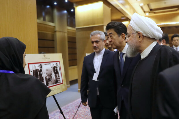 Rouhani, Abe pay visit to Iran-Japan relations expo