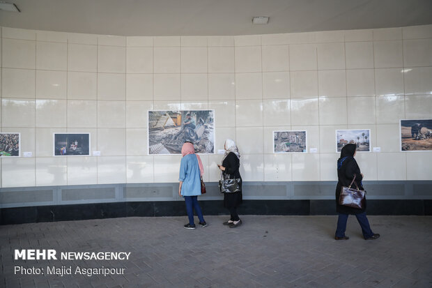 Photo Exhibition on “Flood” opens in Vali-e Asr Sq. (AS) Expectation Verandah 