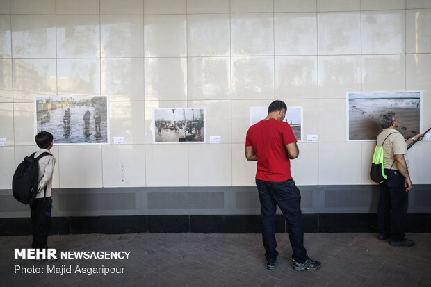 Photo Exhibition on “Flood” opens in Vali-e Asr Sq. (AS) Expectation Verandah 