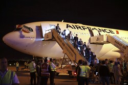File photo: Passengers exit an Air France plane after it landed at Tehran’s Imam Khomeini International Airport, south of the capital Tehran.