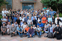 Winners pose with the organizers in front of the Iranian Artists Forum in Tehran on June 27, 2019 after being honored at the 3rd Iran Press Photo Awards. (Mehr/Mahmud Rahimi)