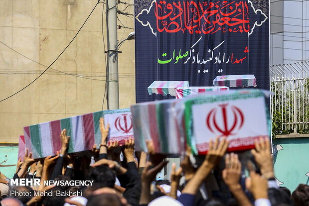 Several anonymous martyrs laid to rest in Qom, Birjand